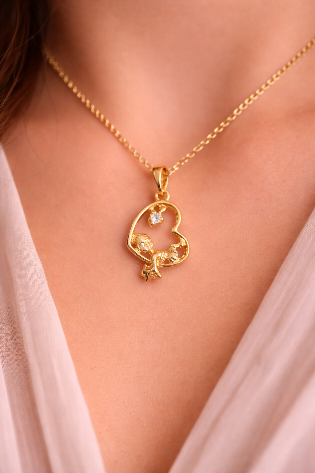 Gold Heart Pendant Necklace with Floral Detail