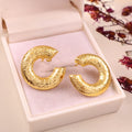 Elegant Textured Gold Crescent Stud Earrings