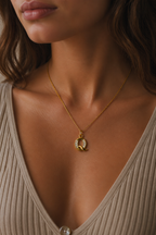 Elegant Gold Initial “Q” Pendant