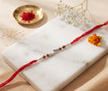 Rakhi with Rudraksha Beads & Silver-Tone Charm