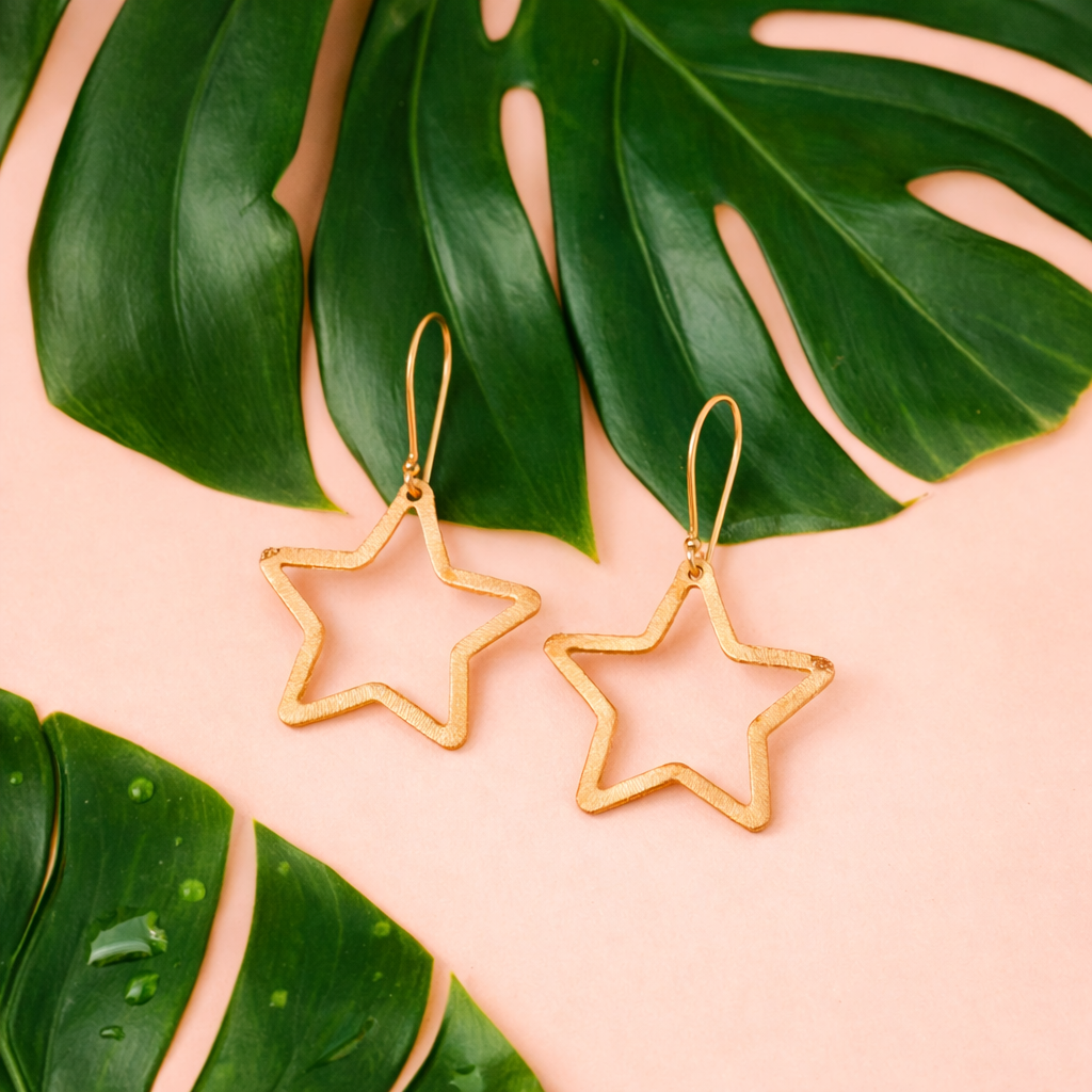 Gold Tone Star Outline Dangle Earrings
