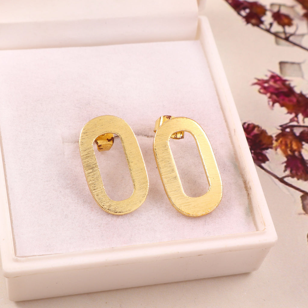 Modern Oval Cut-Out Gold Stud Earrings