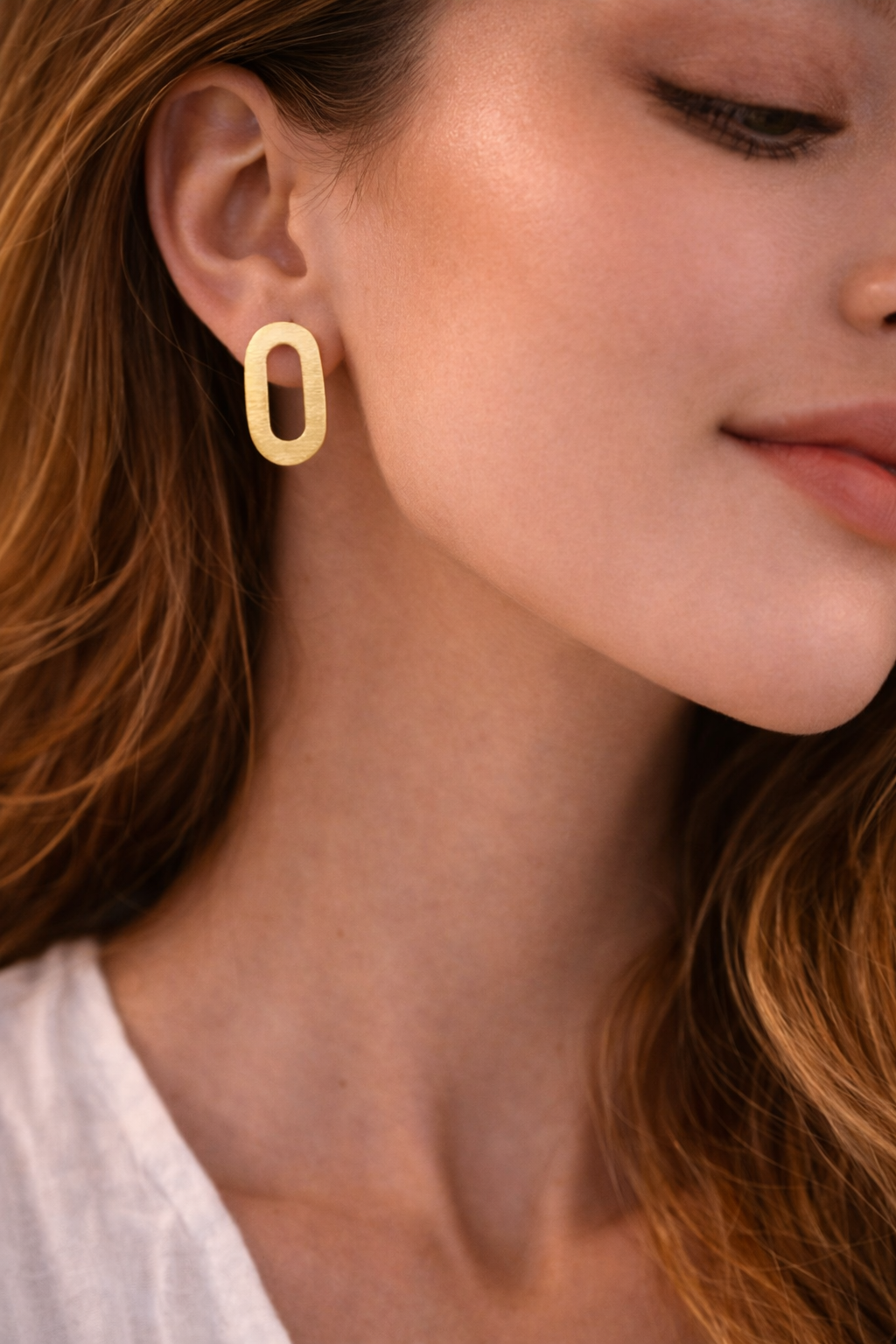 Modern Oval Cut-Out Gold Stud Earrings