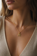 Elegant Gold Initial “M” Pendant