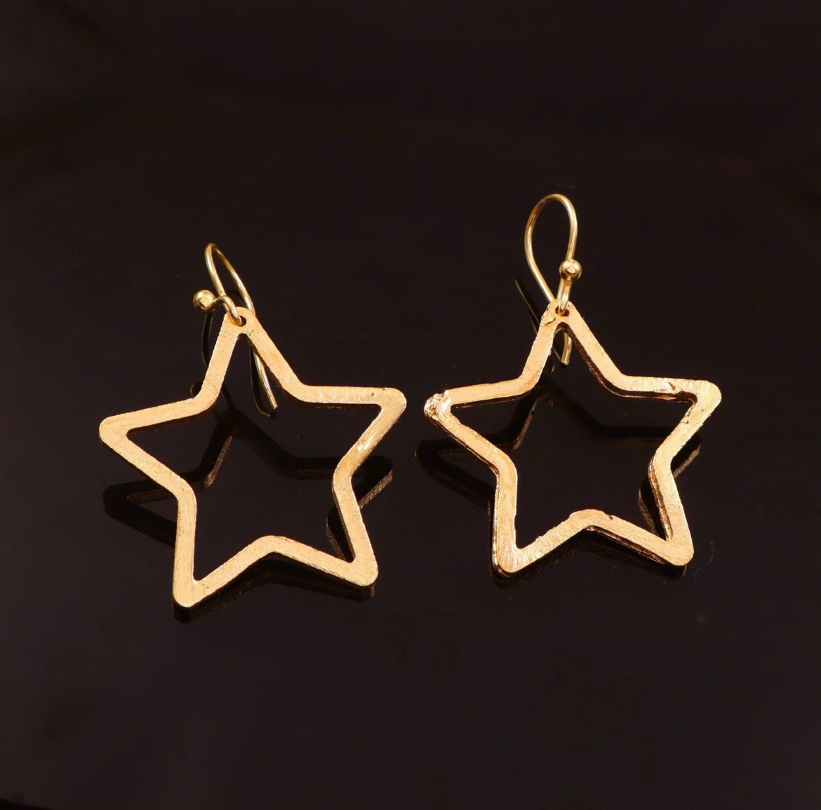 Gold Tone Star Outline Dangle Earrings