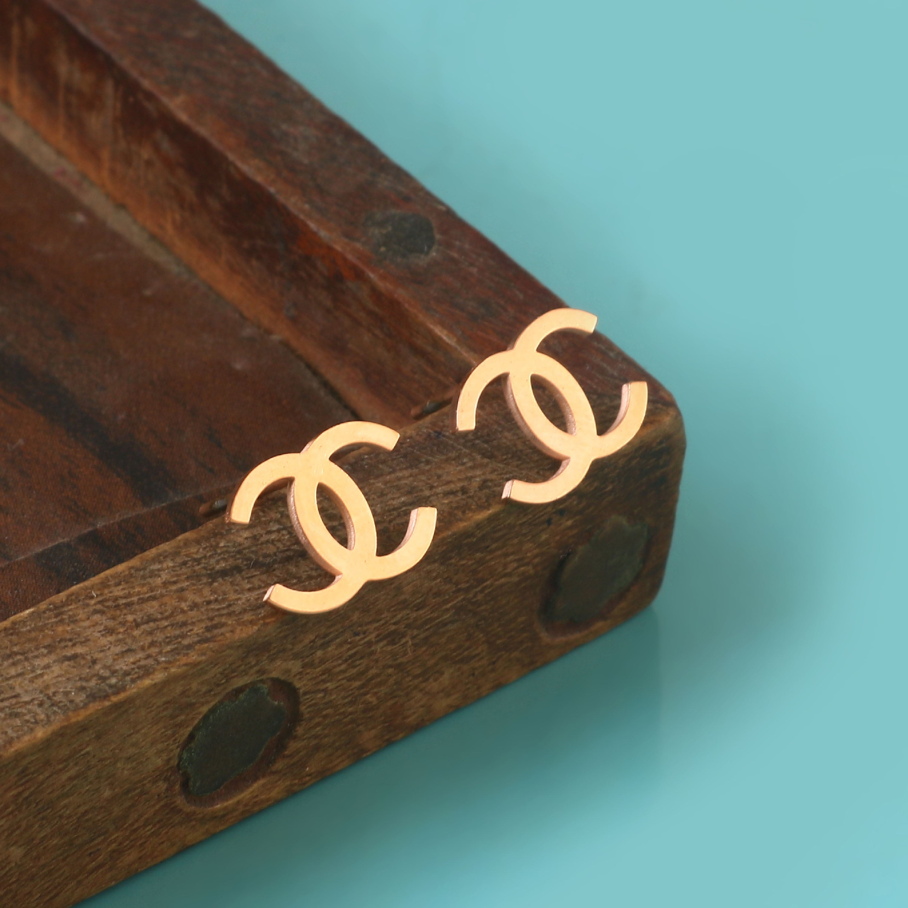 Double-C Emblem Studs